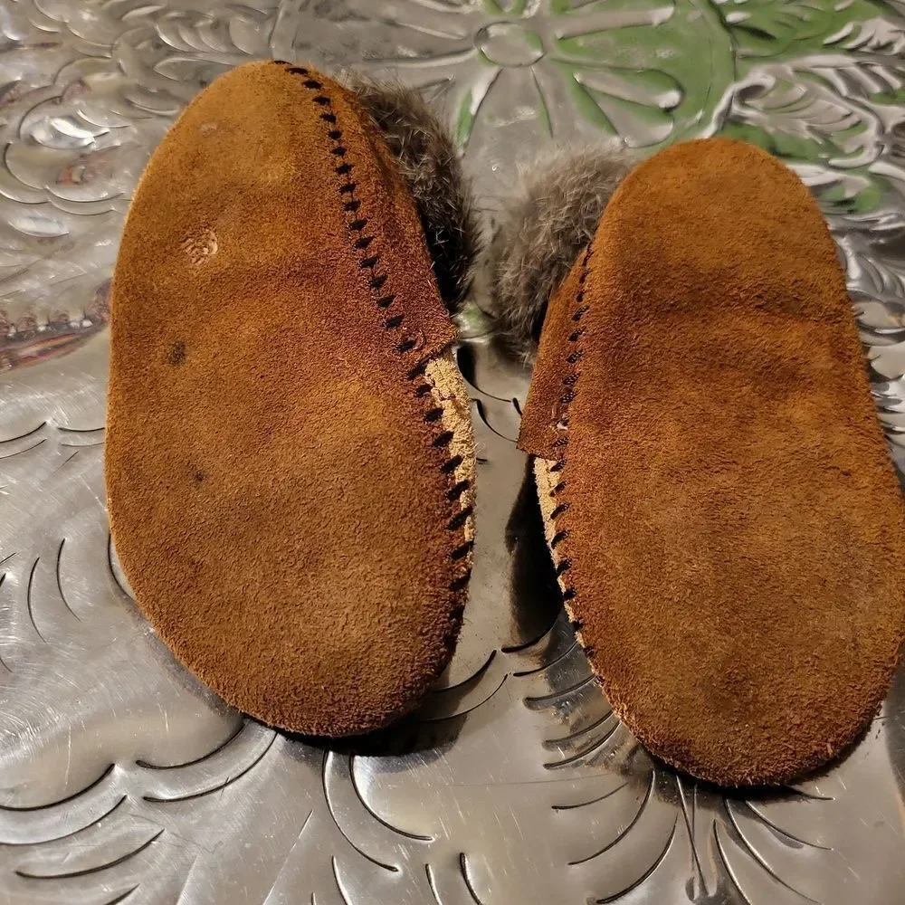 Moccasins,  real leather and real rabbit fur,  has a great insole! Size 8 child